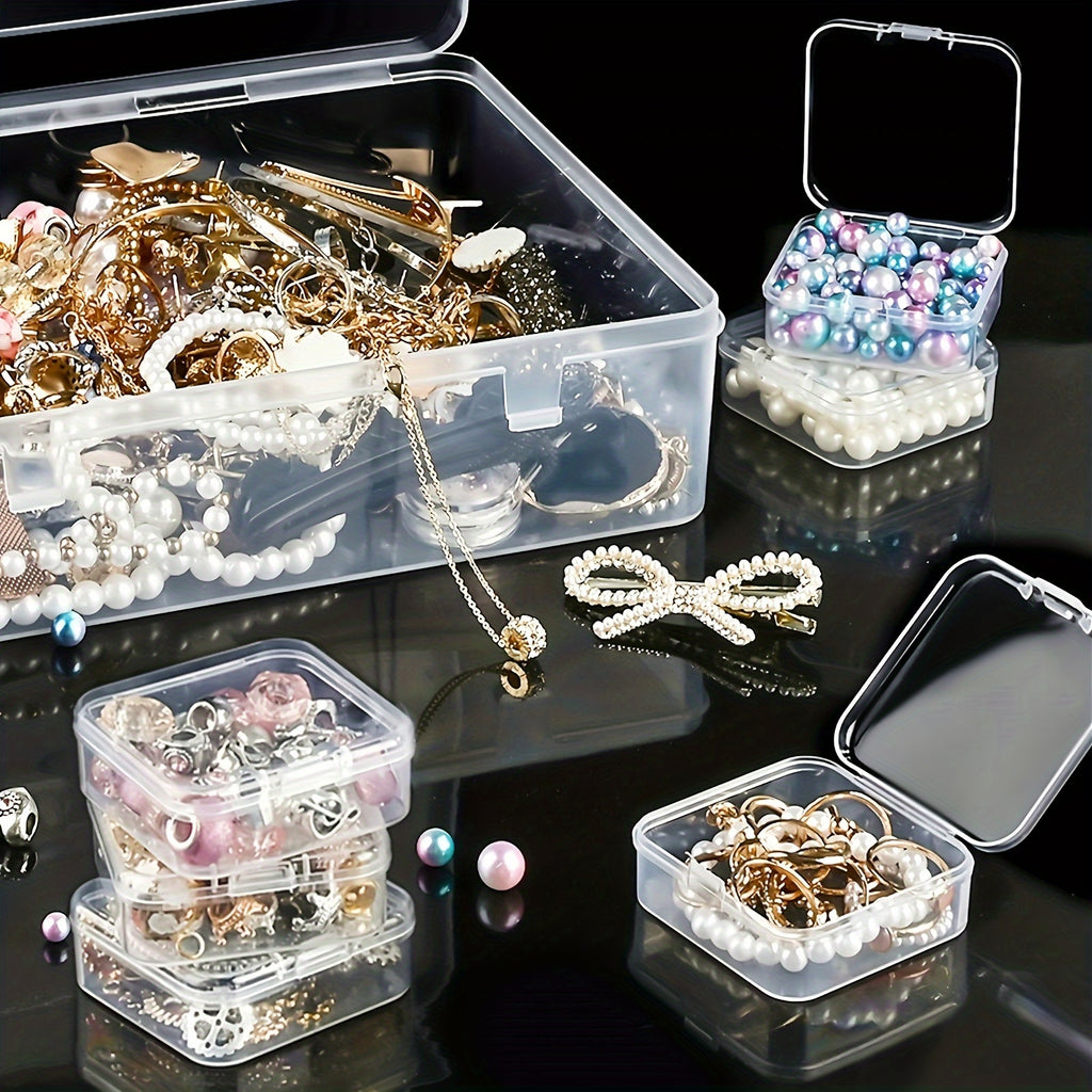 Jewelry set with necklaces, earrings, and hair accessories displayed on a reflective black surface.