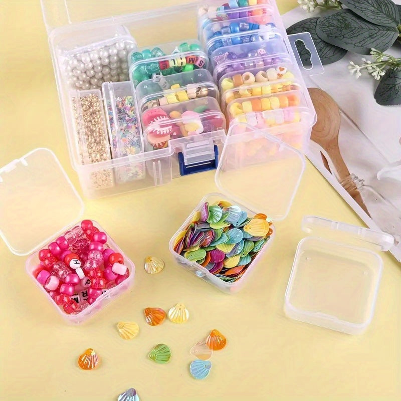 Assorted colorful beads and small items in transparent containers on a yellow surface.